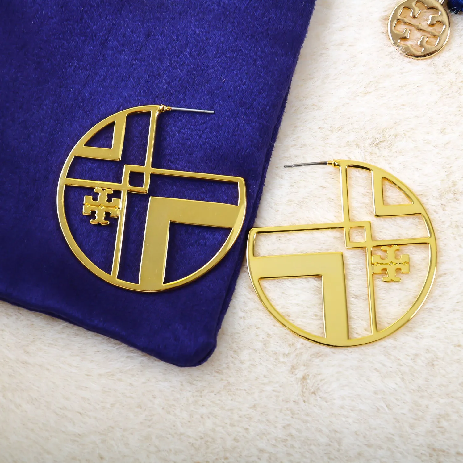 gold geometric logo hoop earring
